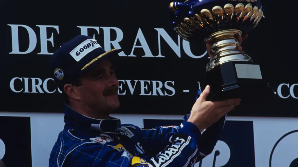 French Grand Prix, Magny-Cours, France. 1991 
Podium Nigel Mansell Williams FW 14 wins the race, Alain Prost Ferrari 642 is 2nd and Ayrton Senna Mclaren-Honda MP4/6 3rd
© Formula One Pictures / Picture by John Townsend.  jt@f1pictures.com www.f1pictures.com. Tel +36 70 776 9682 Vat No UK 221 9053 92.
 
