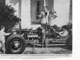 A famous show business family: Hollywood actor Keenan Wynn looks on with his famous comedian father, Ed, as his sons play around with his Welch Special in the 1940s. Tracy would grow up to be a screenwriter whose credits include The Longest Yard.