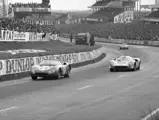 Chassis no. 5893, #14, leads a Lola T70 Mk III at the 1968 24 Hours of Le Mans.