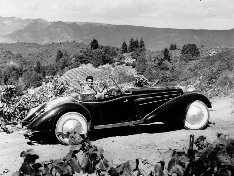 Rock Hudson sits in 855007, ca. 1958.