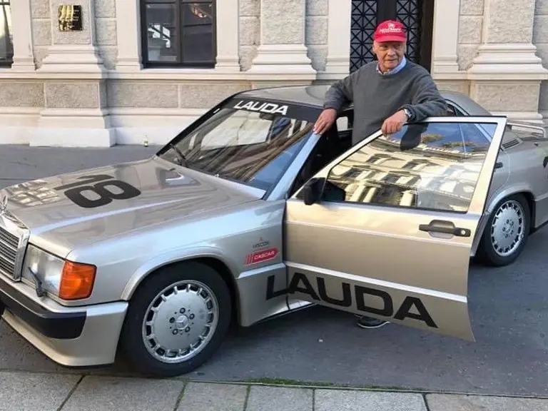 Niki Lauda is pictured with the Mercedes-Benz he drove at the 1984 Nürburgring “Race of Champions".