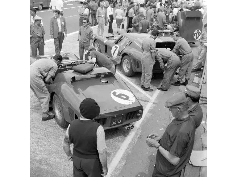 CIRCUIT DE LA SARTHE, FRANCE - JUNE 23: Olivier Gendebien / Phil Hill, SpA Ferrari SEFAC, Ferrari 330 TRI/LM (Spyder), Mike Parkes / Lorenzo Bandini, SpA Ferrari SEFAC, Ferrari 330 LM/GTO, and Ricardo Rodriguez / Pedro Rodriguez, SpA Ferrari SEFAC, Ferrari Dino 246 SP during the 24 Hours of Le Mans at Circuit de la Sarthe on June 23, 1962 in Circuit de la Sarthe, France. (Photo by LAT Images)