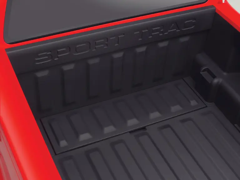 Ford Sport Trac Adrenalin teaser: Adrenalin's composite bed features a storage box (closed) integrated into the load floor.